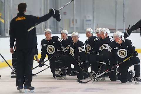 BOSTON – JUNE 26: The first group take a knee as they get instructions before a drill during a Boston Bruins development camp at Warrior Ice Arena in the Brighton neighborhood of Boston on June 26, 2019. (Photo by John Tlumacki/The Boston Globe via Getty Images)