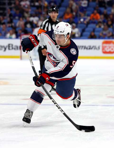 Sep 30, 2023; Buffalo, New York, USA; Columbus Blue Jackets defenseman Denton Mateychuk (5) takes a shot on goal during the first period against the Buffalo Sabres at KeyBank Center. Mandatory Credit: Timothy T. Ludwig-USA TODAY Sports