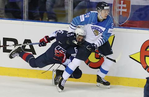 KOSICE, SLOVAKIA-MAY 13: Kaapo Kakko #24 of Finland slash Jack Hughes #6 of USA during the 2019 IIHF Ice Hockey World Championship Slovakia group A game between United States and Finland at Steel Arena on May 13, 2019 in Kosice, Slovakia. (Photo by Xavier Laine/Getty Images)