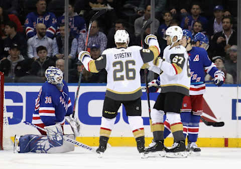 NEW YORK, NEW YORK – DECEMBER 02: Max Pacioretty #67 of the Vegas Golden Knights (R) celebrates his power-play goal at 6:20 of the second period against Henrik Lundqvist #30 of the New York Rangers at Madison Square Garden on December 02, 2019 in New York City. (Photo by Bruce Bennett/Getty Images)