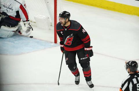 RALEIGH, NC – APRIL 22: Carolina Hurricanes Right Wing Justin Williams (14) reacts after scoring a goal in the third period during a game between the Carolina Hurricanes and the Washington Capitals on April 22, 2019 at the PNC Arena in Raleigh, NC. (Photo by Greg Thompson/Icon Sportswire via Getty Images)