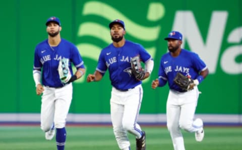 Blue Jays outfielders Lourdes Gurriel Jr., Jackie Bradley Jr. and Teoscar Hernandez. Could the infield shift be replaced by the still-legal outfield shift?. (Photo by Vaughn Ridley/Getty Images)