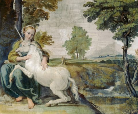 An early 17th-century painting of a young woman and a unicorn.