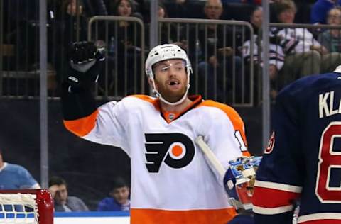 Sean Couturier #14 of the Philadelphia Flyers celebrates his goal at 3:06 of the third period against the New York Rangers . (Photo by Bruce Bennett/Getty Images)