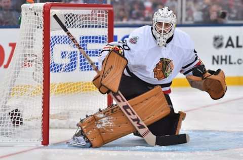 NHL Power Rankings: Chicago Blackhawks goalie Corey Crawford (50) guards the net against the St. Louis Blues during the 2016 Winter Classic ice hockey game at Busch Stadium. Mandatory Credit: Jasen Vinlove-USA TODAY Sports