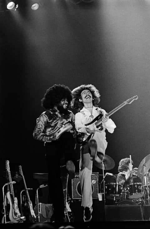 George Harrison and Billy Preston perform on stage at Maryland's Capitol Center in 1974.