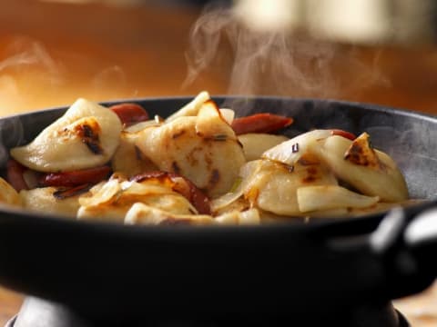 Pan Frying Perogies with Ukrainian Sausage and Onions