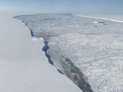 The ice on the left is the Larsen C ice shelf; the right, the western edge of A-68.