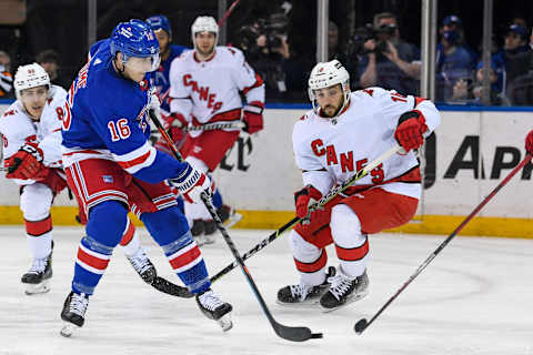 Apr 12, 2022; New York, New York, USA; New York Rangers center Ryan Strome (16) attempts a shot against the Carolina Hurricanes during the third period at Madison Square Garden. Mandatory Credit: Dennis Schneidler-USA TODAY Sports