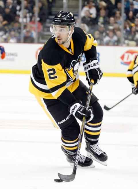 Nov 28, 2015; Pittsburgh, PA, USA; Pittsburgh Penguins defenseman Adam Clendening (2) skates with the puck against the Edmonton Oilers during the third period at the CONSOL Energy Center. The Oilers won 3-2 in a shootout. Mandatory Credit: Charles LeClaire-USA TODAY Sports