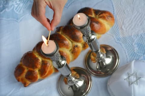 lighting Shabbat candles