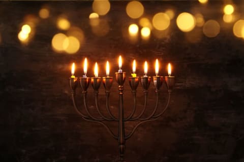 menorah against a dark background