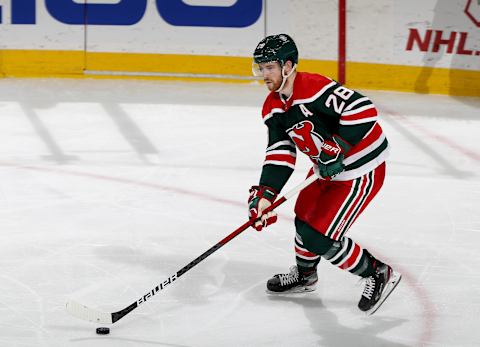 Damon Severson #28 of the New Jersey Devils. (Photo by Elsa/Getty Images)