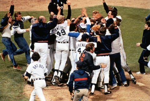 (Original Caption) USA: Field enthusiasm, the Detroit Tigers jump for joy after their World Series victory over the San Diego Padres.