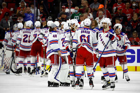 New York Rangers celebrate their 6-2 victory over the Carolina Hurricanes in Game Seven of the Second Round (Photo by Jared C. Tilton/Getty Images)