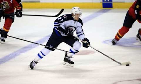 Feb 20, 2016; Sunrise, FL, USA; Winnipeg Jets left wing Nikolaj Ehlers (27) skates with the puck in the third period of a game against the Florida Panthers at BB&T Center. Mandatory Credit: Robert Mayer-USA TODAY Sports