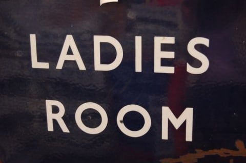 Ladies' room sign