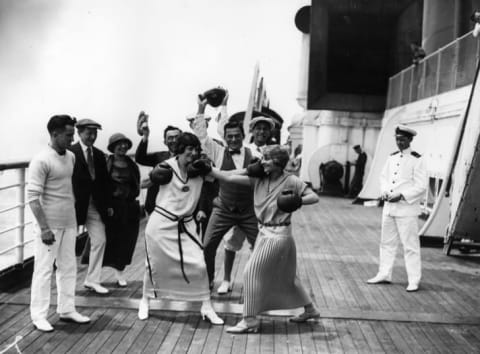 Women boxing on a ship, 1923.