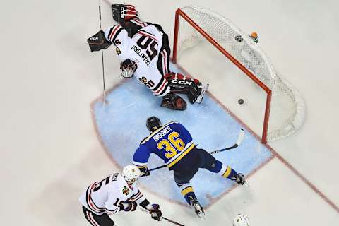 Apr 25, 2016; St. Louis, MO, USA; St. Louis Blues right wing Troy Brouwer (36) scores the game-winning goal against the Chicago Blackhawks during the third period in game seven of the first round of the 2016 Stanley Cup Playoffs at Scottrade Center. The St. Louis Blues defeat the Chicago Blackhawks 3-2. Mandatory Credit: Jasen Vinlove-USA TODAY Sports