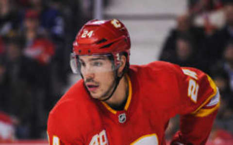 CALGARY, AB – DECEMBER 12: Travis Hamonic #24 of the Calgary Flames in action against the Toronto Maple Leafs during an NHL game at Scotiabank Saddledome on December 12, 2019 in Calgary, Alberta, Canada. (Photo by Derek Leung/Getty Images)