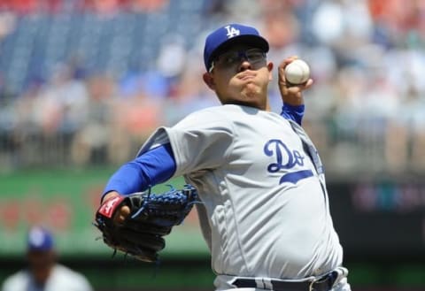 Jul 21, 2016; Washington, DC, USA; Los Angeles Dodgers starting pitcher Julio Urias (7) throws to the Washington Nationals during the second inning at Nationals Park. Mandatory Credit: Brad Mills-USA TODAY Sports