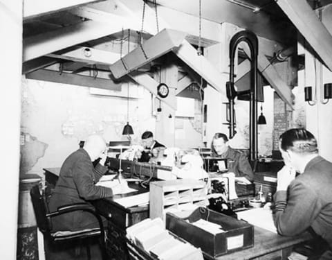 Map Room Officers at work in the Cabinet War Rooms, 1945.