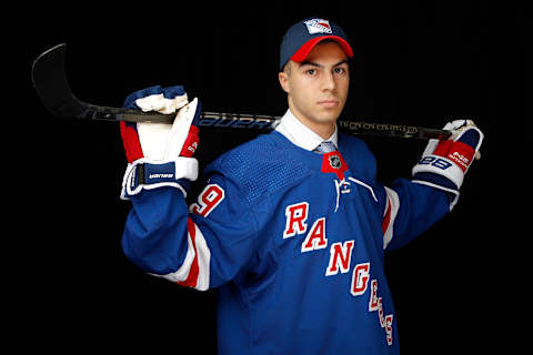 Eric Ciccolini poses after being selected 205th overall by the New York Rangers during the 2019 NHL Draft (Photo by Kevin Light/Getty Images)