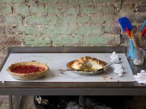 Two pies on a table at Pie Lab.