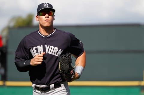 Mar 3, 2015; Clearwater, FL, USA; New York Yankees right fielder Aaron Judge (99) runs back into the dugout during a spring training baseball game at Bright House Field. Mandatory Credit: Kim Klement-USA TODAY Sports