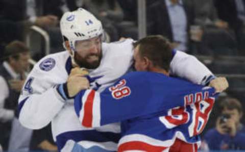 NEW YORK, NEW YORK – OCTOBER 29: Pat Maroon #14 of the Tampa Bay Lightning and Micheal Haley #38 of the New York Rangers fight during the first period at Madison Square Garden on October 29, 2019 in New York City. (Photo by Bruce Bennett/Getty Images)