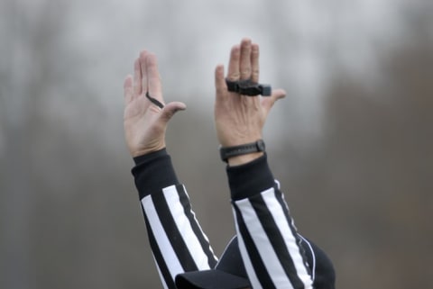 referee calling a touchdown