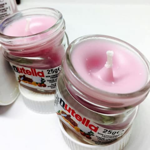 Candles in Nutella jars.