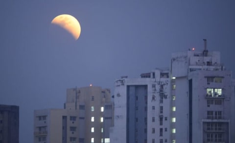 The moon is seen during a lunar eclipse referred to as the "super blue blood moon," in Kolkata, India, on January 31, 2018.