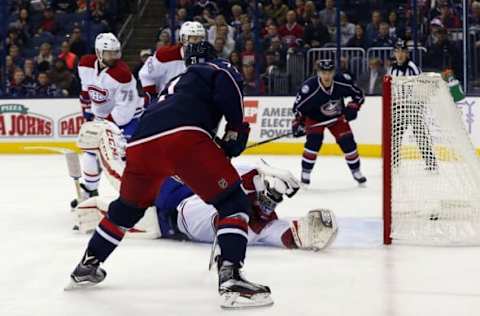 NHL Power Rankings: Columbus Blue Jackets left wing Nick Foligno (71) scores over a sliding Montreal Canadiens goalie Al Montoya (35) during the second period at Nationwide Arena. Mandatory Credit: Russell LaBounty-USA TODAY Sports