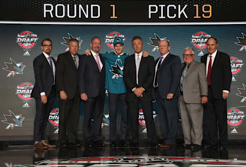 CHICAGO, IL – JUNE 23: (3rd from L-R) Head coach Peter DeBoer, 19th overall pick Josh Norris, general manager Doug Wilson, scout Mike Yandle, scout Pat Funk and Tim Burke director of scouting of the San Jose Sharks during Round One of the 2017 NHL Draft at United Center on June 23, 2017 in Chicago, Illinois. (Photo by Dave Sandford/NHLI via Getty Images)