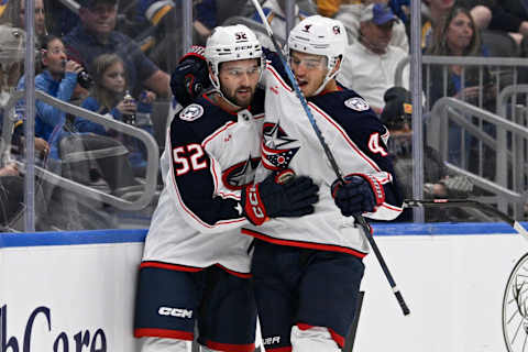 Sep 26, 2023; St. Louis, Missouri, USA; Columbus Blue Jackets center Cole Sillinger (4) congratulates right wing Emil Bemstrom (52) on his goal against the St. Louis Blues during the first period at Enterprise Center. Mandatory Credit: Jeff Le-USA TODAY Sports