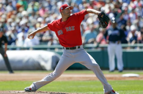 Mar 3, 2017; Lake Buena Vista, FL, USA; Boston Red Sox starting pitcher Rick Porcello (22) throws a pitch during the first inning of an MLB spring training baseball game against the Atlanta Braves at Champion Stadium. Mandatory Credit: Reinhold Matay-USA TODAY Sports. MLB.