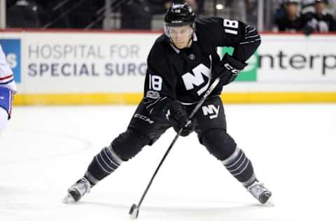 New York Islanders center Ryan Strome (18) takes a backhanded shot (Brad Penner-USA TODAY Sports)