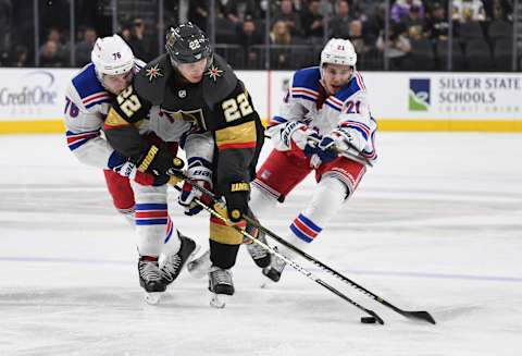 LAS VEGAS, NV – JANUARY 08: Nick Holden #22 of the Vegas Golden Knights battles Brady Skjei #76 of the New York Rangers for the puck during the second period at T-Mobile Arena on January 8, 2019 in Las Vegas, Nevada. (Photo by Jeff Bottari/NHLI via Getty Images)