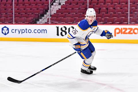 MONTREAL, QC – FEBRUARY 13: Rasmus Dahlin #26 of the Buffalo Sabres skates against the Montreal Canadiens during the second period at Centre Bell on February 13, 2022 in Montreal, Canada. The Buffalo Sabres defeated the Montreal Canadiens 5-3. (Photo by Minas Panagiotakis/Getty Images)