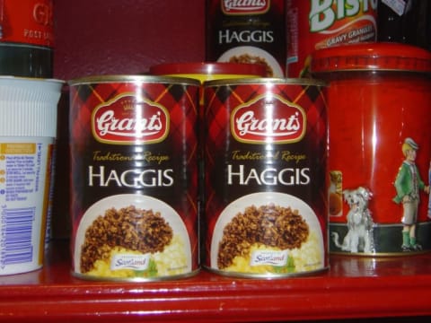 Canned haggis on a store shelf