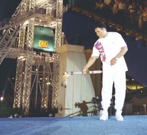 Muhammad Ali with torch.