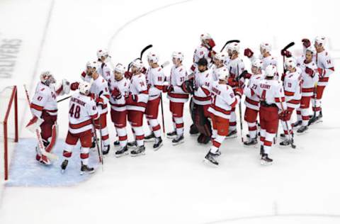 TORONTO, ONTARIO – AUGUST 04: James Reimer #47 of the Carolina Hurricanes celebrates with his teammates after defeating the New York Rangers in Game Three of the Eastern Conference Qualification Round prior to the 2020 NHL Stanley Cup Playoffs at Scotiabank Arena on August 04, 2020 in Toronto, Ontario, Canada. (Photo by Andre Ringuette/Freestyle Photo/Getty Images)