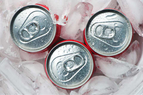 Soda cans on ice.