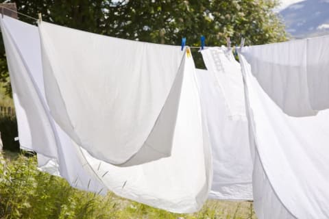 white sheets on clothesline