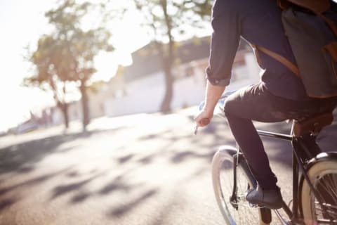 Man riding a bike.