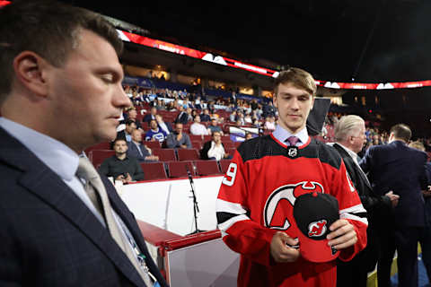 Daniil Misyul reacts after being selected 70th overall by the New Jersey Devils (Photo by Bruce Bennett/Getty Images)