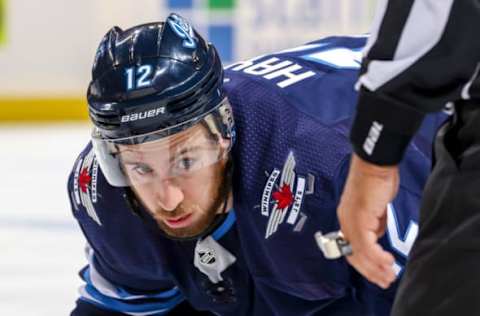 WINNIPEG, MB – APRIL 18: Kevin Hayes #12 of the Winnipeg Jets gets set during a second period face-off against the St. Louis Blues in Game Five of the Western Conference First Round during the 2019 NHL Stanley Cup Playoffs at the Bell MTS Place on April 18, 2019 in Winnipeg, Manitoba, Canada. (Photo by Jonathan Kozub/NHLI via Getty Images)