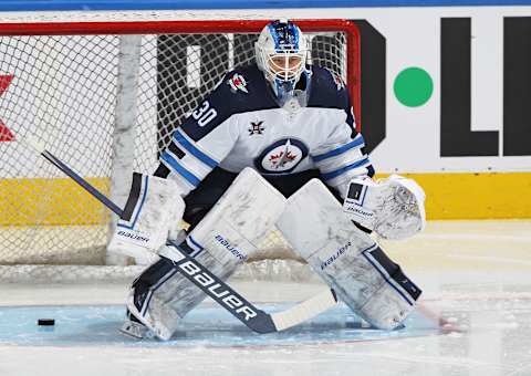 TORONTO, ON – MARCH 9: Laurent Brossoit #30 of the Winnipeg Jets warms up prior to action against the Toronto Maple Leafs. (Photo by Claus Andersen/Getty Images)