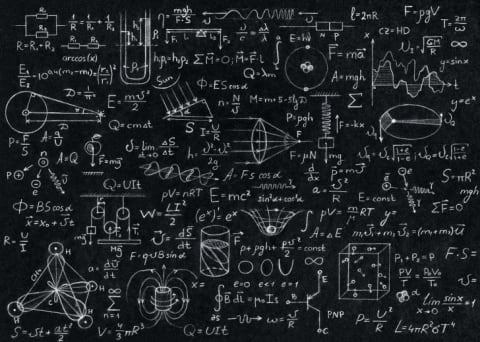 Blackboard with math and science equations on it